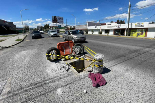 Coladera abierta sobre avenida Lerma, en el municipio de Metepec