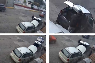 Pese al paso de vehículos y peatones, el sujeto retira la batería y trata de sustraer también la computadora del auto. 