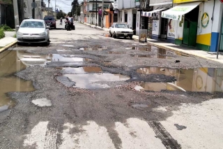 Piden vecinos de San Pedro Totoltepec bacheo urgente en calles intransitables
