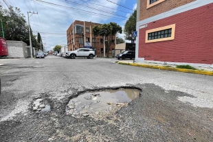 Baches en calle Motolinia